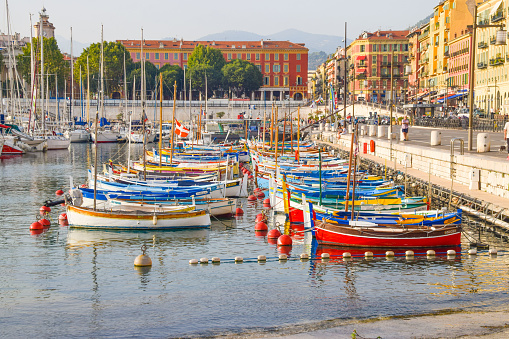 Nice, France - August 11 2019: Colourful boats moored in Port Lympia.