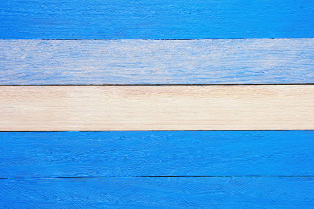 Texture of painted wooden boards, blue background for text