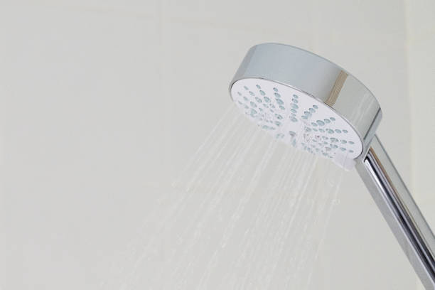 simple image of shower head in action