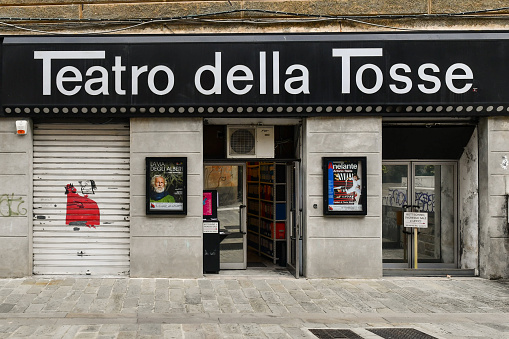 Genoa, Liguria, Italy - 10 21 2022: Facade and sign of the Teatro della Tosse theatre in the old town.
