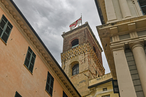 Genoa, Liguria, Italy - 10 23 2022: The Grimaldina Tower is located next to the Doge's Palace, in the city center of Genoa.