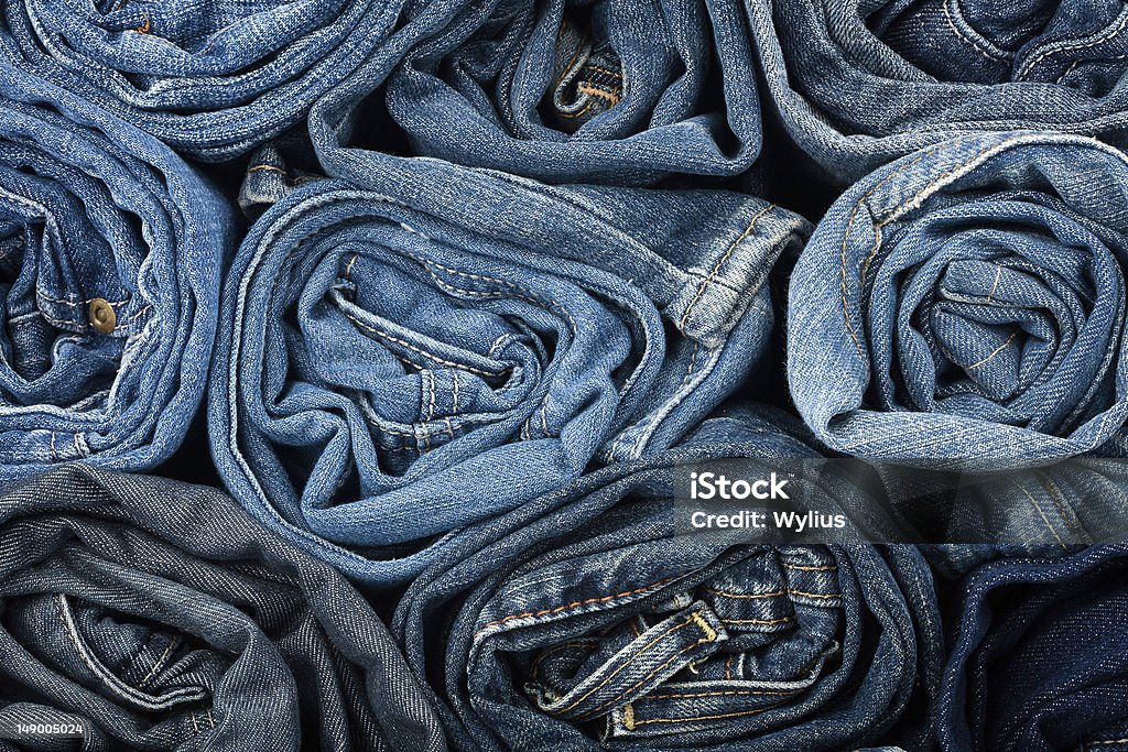 Stack of blue jeans Stack of blue jeans as a background or texture Blue Stock Photo