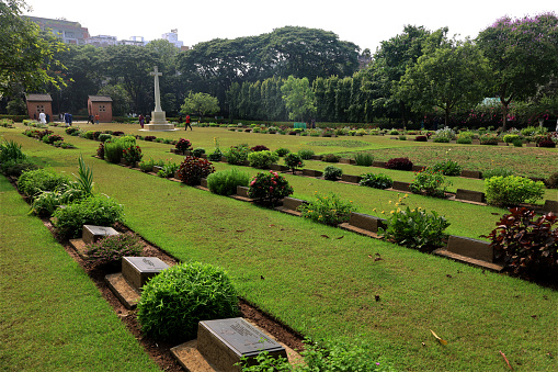 This cemetery was established to honor Commonwealth soldiers and others who died in World War II. The cemetery was created by the British Army, and there were originally about 400 burials. Graves have since been transferred to this cemetery from the Lushai Hills (Assam) and other isolated sites, and from Chittagong Civil Cemetery; Chandragona Baptist Mission Cemetery; Chiringa Military Cemetery; Cox's Bazar New Military and Civil (Muhammadan) Cemeteries; Chittagong (Panchalaish) Burial Ground; Dacca Military Cemetery; Demagiri Cemetery; Dhuapolong Muslim Burial Ground; Dhuapolong Christian Military Cemetery; Dohazari Military and R.A.F. Cemeteries; Jessore Protestant Cemetery; Khulna Cemetery; Khurushkul Island Christian and Muhammadan Cemeteries; Lungleh Cemetery (Assam); Nawapara Cemetery (Assam); Patiya Military Cemetery, Rangamati Cemetery; Tejgaon Roman Catholic Cemetery; Tumru Ghat Military Cemetery and Tumru M.D.S. Hospital Cemetery.\nThere are now 731 Commonwealth burials of the 1939-45 war here, 17 of which are unidentified.\nThere are a further 20 foreign national burials, 1 being a seaman of the Dutch Navy and 19 Japanese soldiers, 1 of which is unidentified. There are also 4 non-war U.K. military burials.