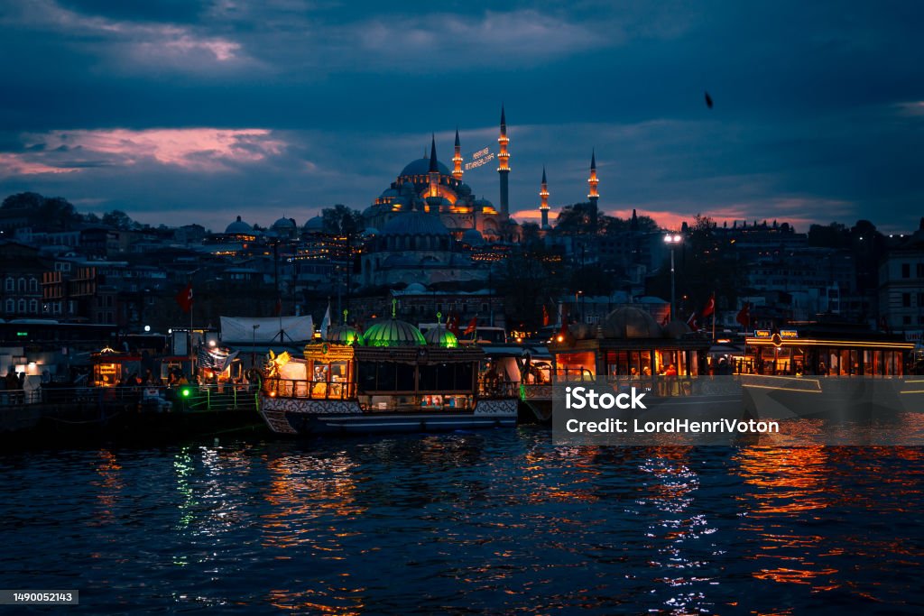 View of Yeni Cami Mosque at night, Istanbul View of Yeni Cami Mosque at night, Istanbul, Turkey Architectural Dome Stock Photo