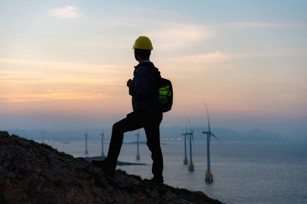 istock Climbers admiring the view after sunset 1490053147