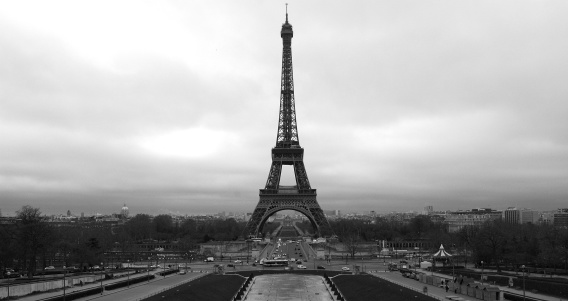 Eiffel Tower with clouded sky in Paris, France, taken in Fall/Autumn in 2010.