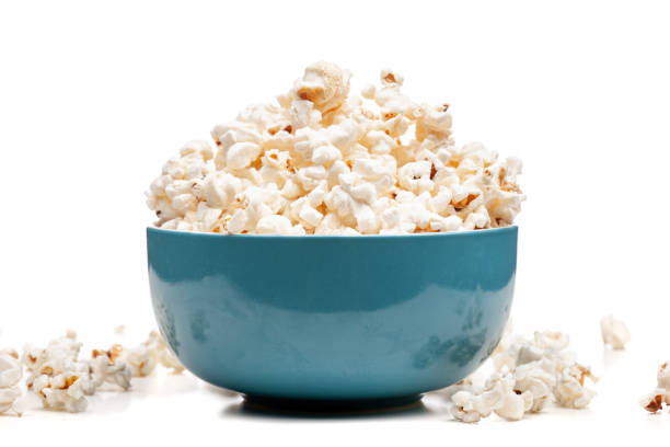 blue bowl with popcorn stock photo