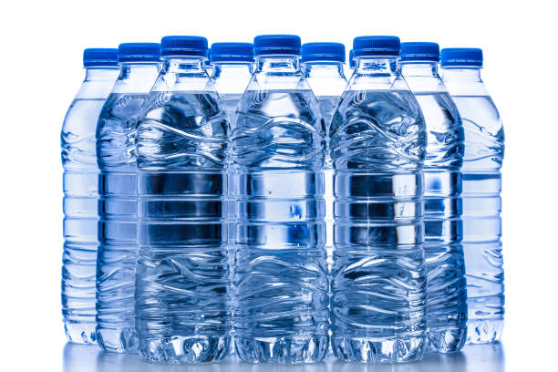 istock pile of half litre plastic water bottles with blue cap 1490058910