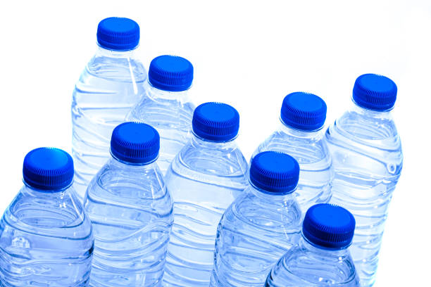 istock pile of half litre plastic water bottles with blue cap 1490058912