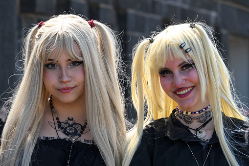 Dusseldorf, Germany, May 13, 2023 - Two young women dressed as manga at Japan Day in Dusseldorf - where thousands of cos-players gather on the lower banks of the Rhine for a street festival