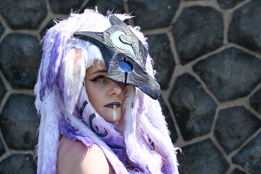 Dusseldorf, Germany, May 13, 2023 - A young lady dressed as Kindred from League of Legends at Japan Day in Dusseldorf - where thousands of cos-players gather on the lower banks of the Rhine for a street festival
