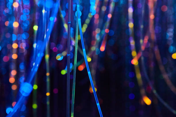 istock Abstract neon glowing tunnel of lights 1490074061