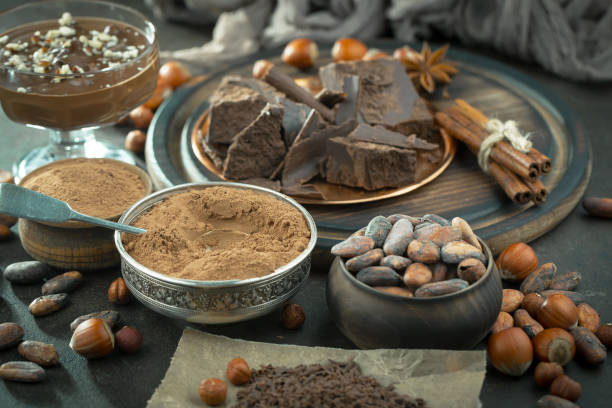 istock Chocolate, nuts, cocoa beans in a composition on an old background. 1490074220