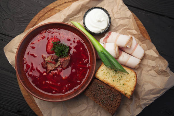 istock Red Russian Borscht soup with bacon and bread 1490074309