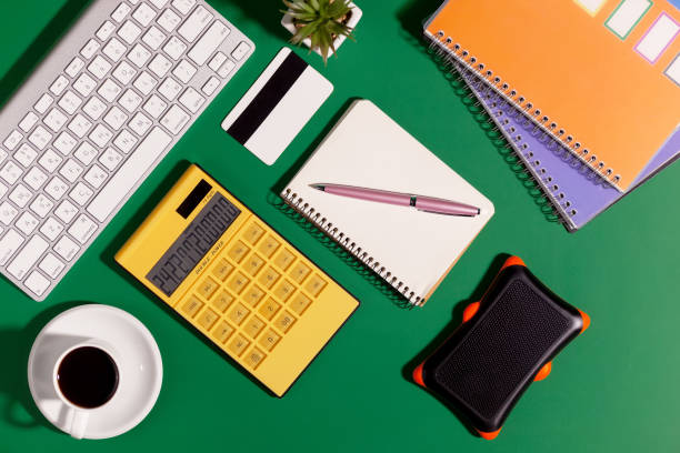 istock Items for business and accounting on a bright, colored background. 1490079445