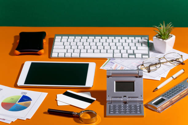 istock Items for business and accounting on a bright, colored background. 1490079464