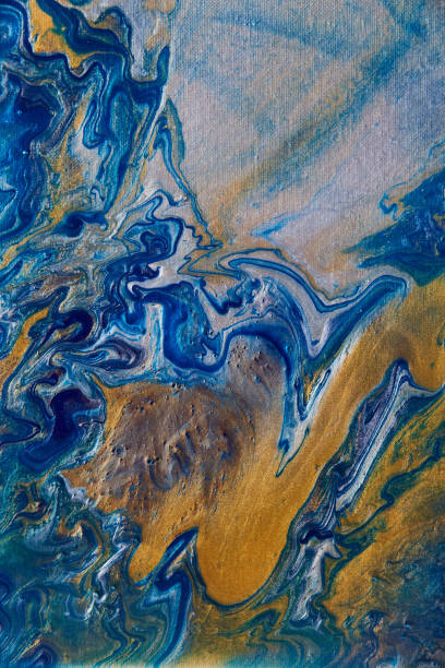 istock Blue and gold acrylic pouring on canvas 1490080375