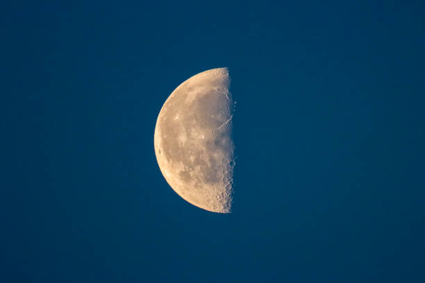 istock A beautiful shot of a half moon shortly before sunrise 1490080485
