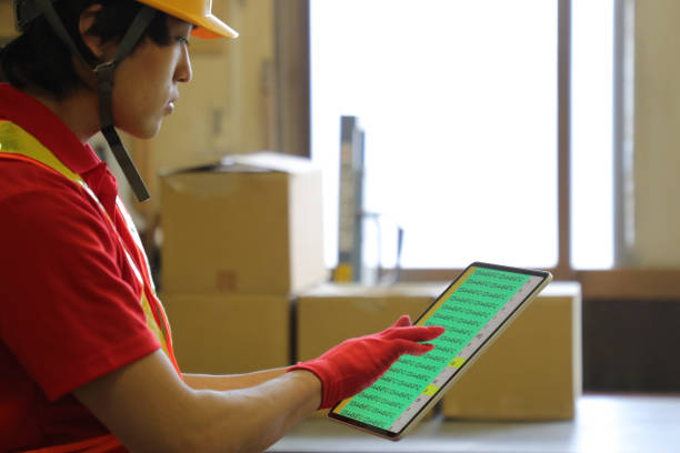 istock Man reviewing digital data at Logistics Centers 1490082701