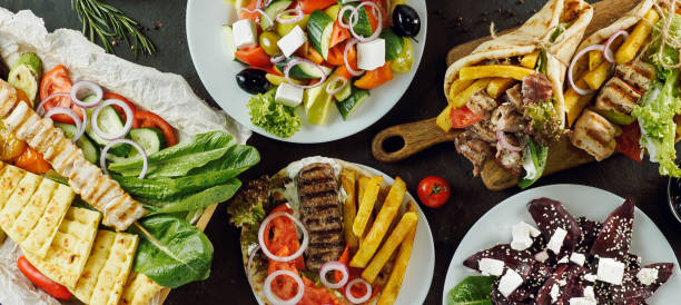 greek cuisine selected assortment of dishes - opa! souvlaki of greece imagens e fotografias de stock