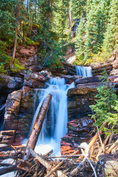 istock Colorful canyon with logs holding back waterfalls 1490084105