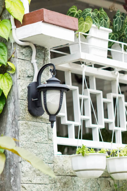 istock Antique iron lantern on the outside wall 1490084990