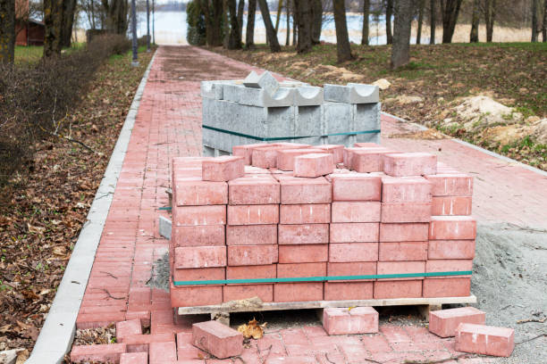istock A brick walkway with a green lawn in the background. 1490085650
