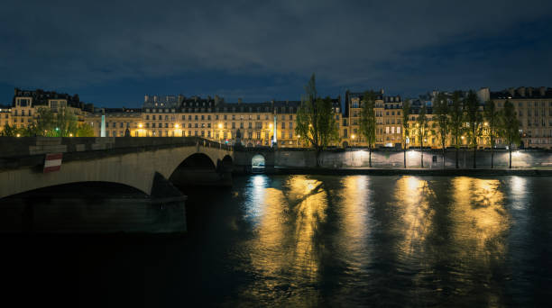 Lights reflected in the River Seine in Paris at night
