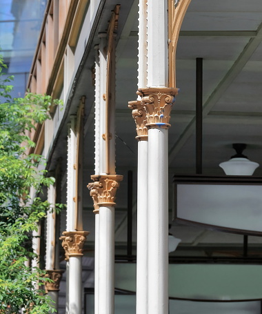 Colonnade supporting the posted and cantilevered verandah running along the whole first level of the ancient, AD 1891 built E.Way and Co.building facade facing Pitt Street Mall. Sydney-NSW-Australia.