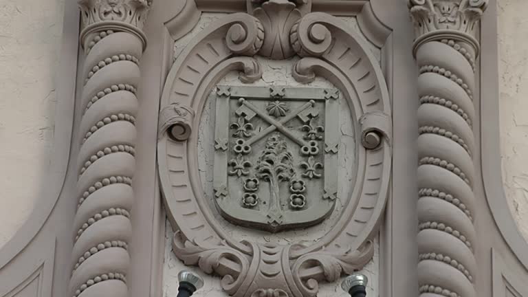 Bas Relief with Coat of Arms at the Entrance of Monserrat School (Colegio Nacional de Monserrat), UNESCO World Heritage Site, Cordoba City, Cordoba Province, Argentina. Close Up.