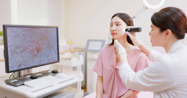 istock doctor examines skin 1490103164