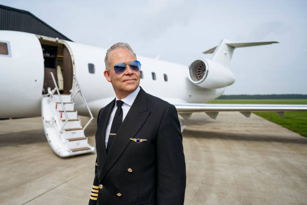 istock Portrait of private jet pilot in aviator glasses 1490103600