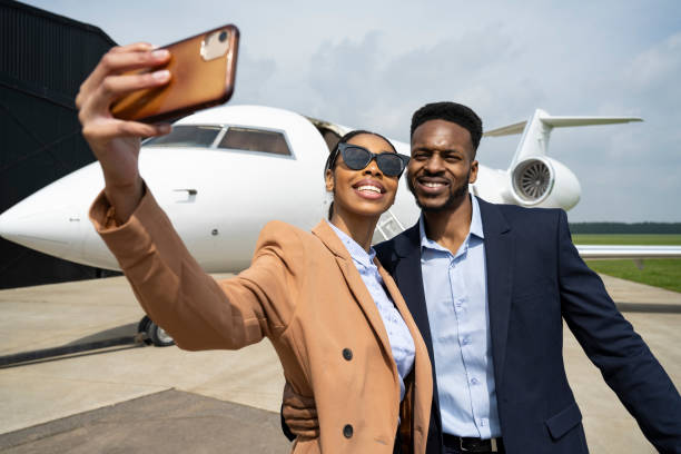 istock Affluent young Black couple taking selfie before travelling 1490103665