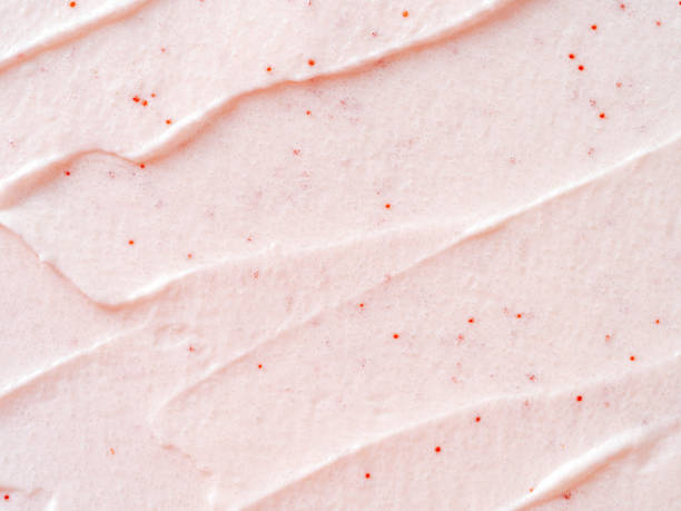 istock Scrub smears. Pink exfoliating body polish texture 1490106489