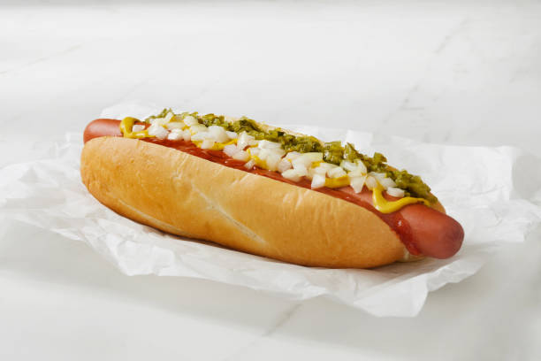 The Foot Long Ballpark Hot Dog with, Ketchup, Mustard, Relish and Onions