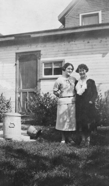 Saskatoon, Saskatchewan, Canada - 1922. Two mid adult women at the city of Saskatoon in Saskatchewan, Canada. Vintage photograph ca. 1922.