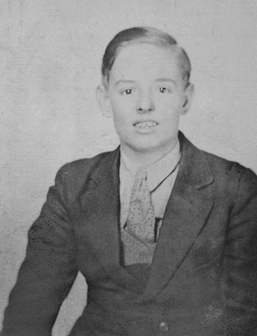 Portrait of a teenage boy. Vintage photograph ca. 1928.