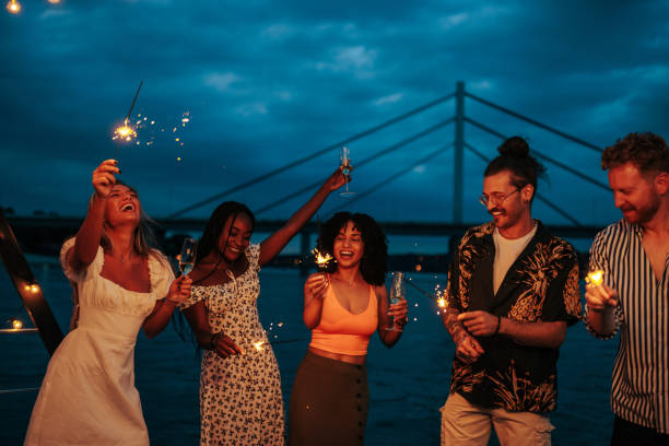 istock Cheerful youth dancing at river. 1490116050