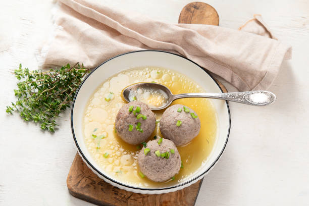 istock Knodel soup bowl and bread. 1490116405