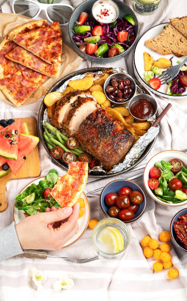 istock Family dinner or lunch. Many dishes on the table. Top view, copy space 1490119040