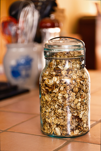 An old canning jar used to store homemade granola