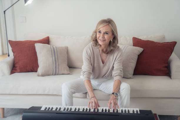 Mature woman playing piano