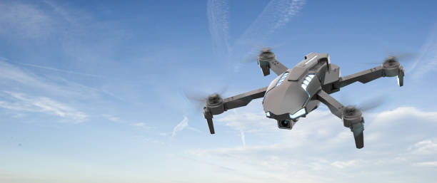 istock Quadcopter air drone isolated in the sky 1490123722