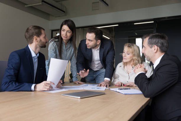 istock Diverse business team colleagues working on project plan 1490130184