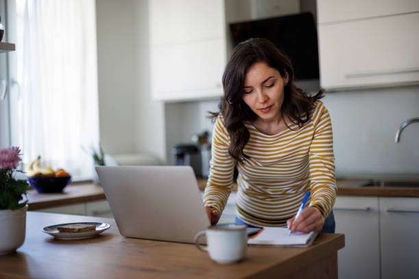 istock Young woman working at home 1490133690