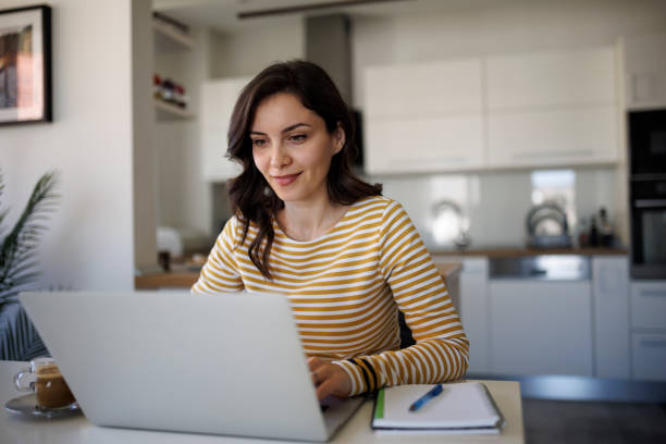 istock Young woman working at home 1490133748