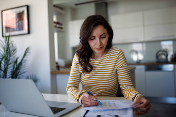 istock Young woman going throught her finances 1490133810