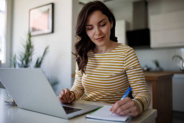 istock Young woman working at home 1490133844