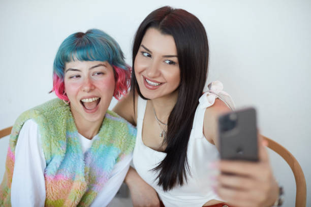 istock Two close friends take a selfie with the phone. 1490134481