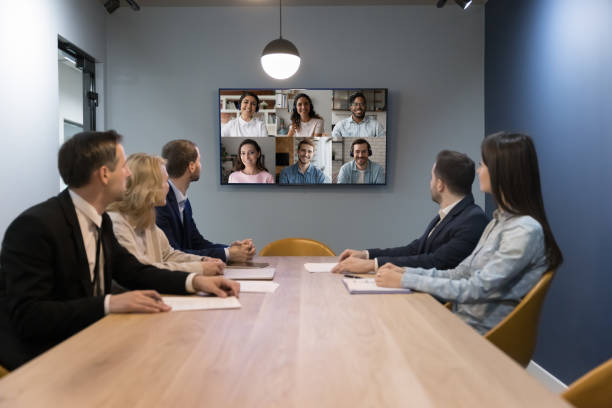 istock Engaged business team talking on conference call to multiethnic partners 1490134700